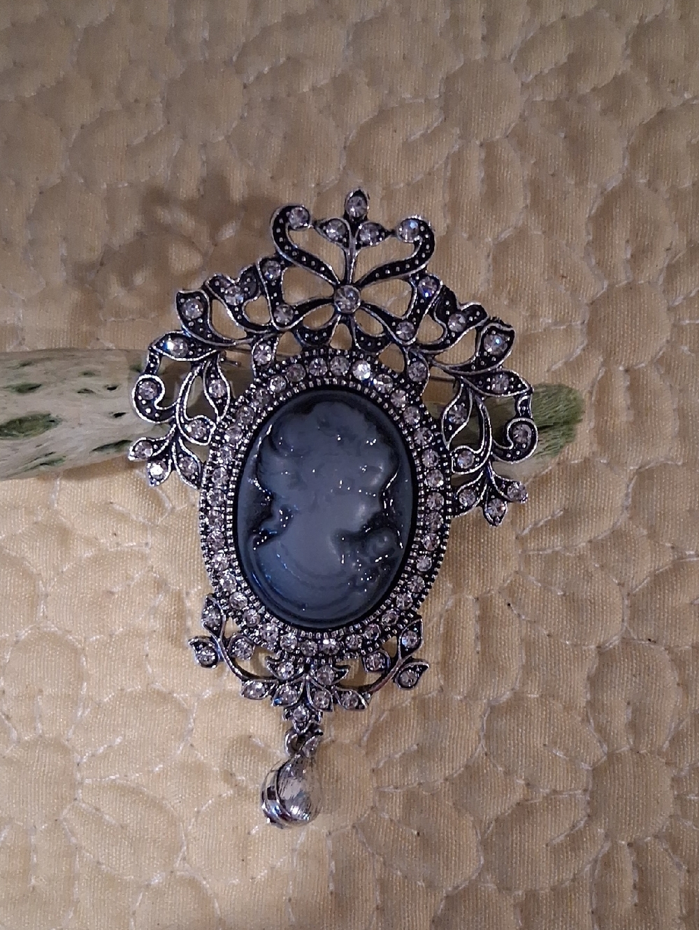 Ornate Silver-Tone Blue Cameo Brooch with Crystal Accents